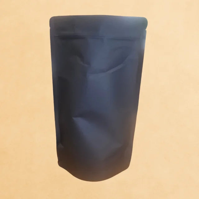 Black kraft compostable stand up pouch.