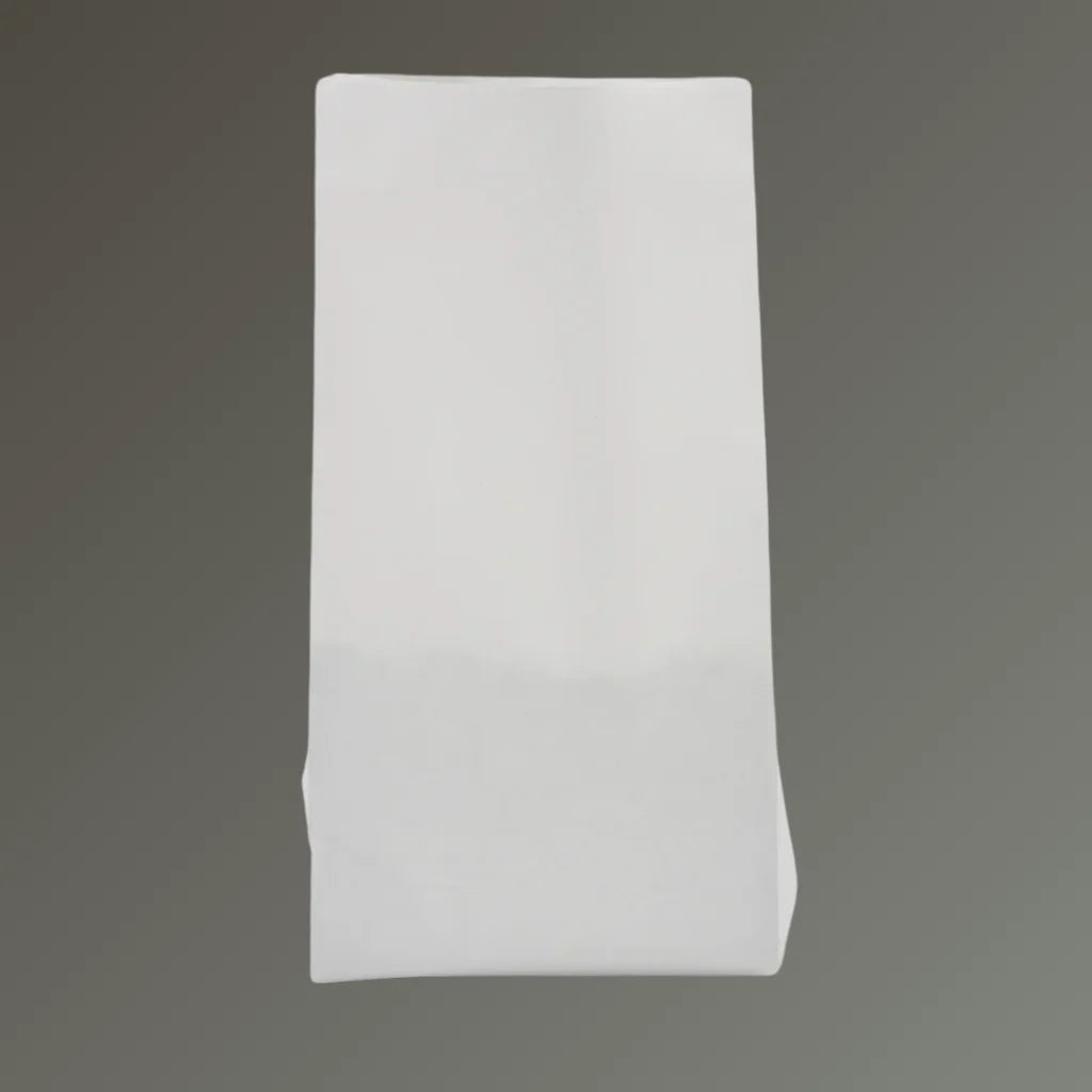 White kraft coffee bag with side gusset and open top, displayed against a grey background.