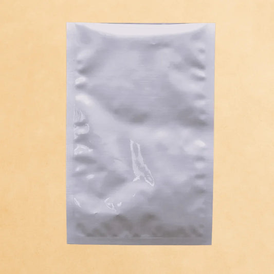 Aluminium sachet with 3 side seal and open top, shown flat against a neutral background.



