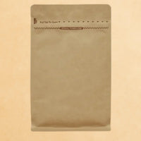 Brown Kraft coffee pouch with Rip n Zip opening and resealable closure, displayed upright against a beige background.