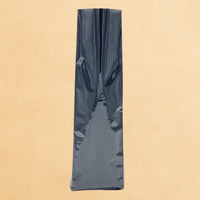 Black side gusset open top coffee bag standing upright on a neutral background.