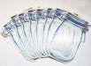 8 blue seal large size mason jar shaped stand up pouches lying flat.