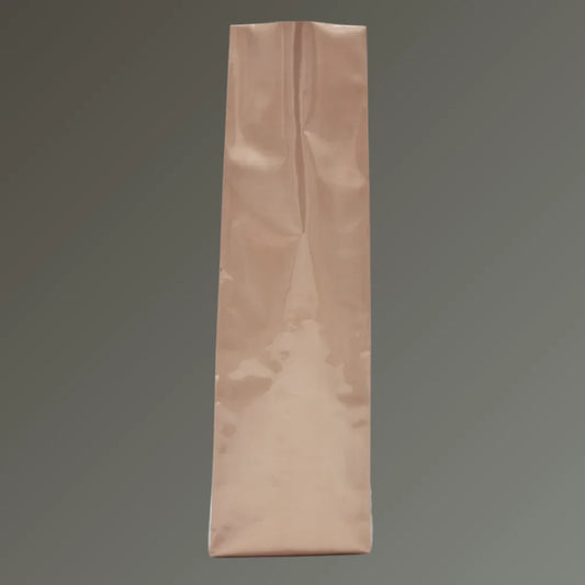 Bronze coffee bag with side gussets and open top, displayed upright against a grey background.