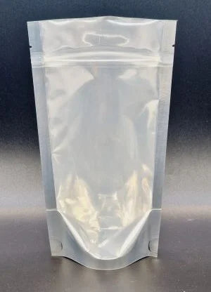 A gold backed clear front stand up pouch with a grip seal and tear notches, front view.