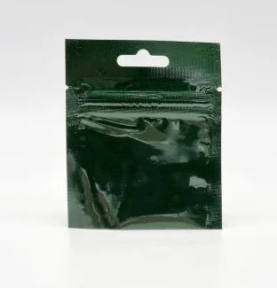 Green resealable sachet pouch with Euro slot and open bottom, displayed upright on a white background.