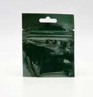 Green resealable sachet pouch with Euro slot and open bottom, displayed upright on a white background.