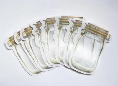 8 yellow rimmed small size mason jar shaped stand up pouches lying flat.